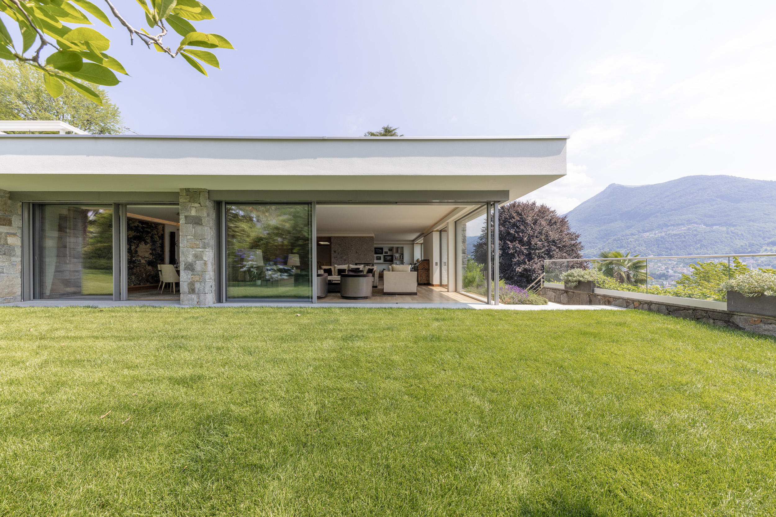 villa lugano tessin switzerland boat yacht lake living area design architecture tommaso spadolini